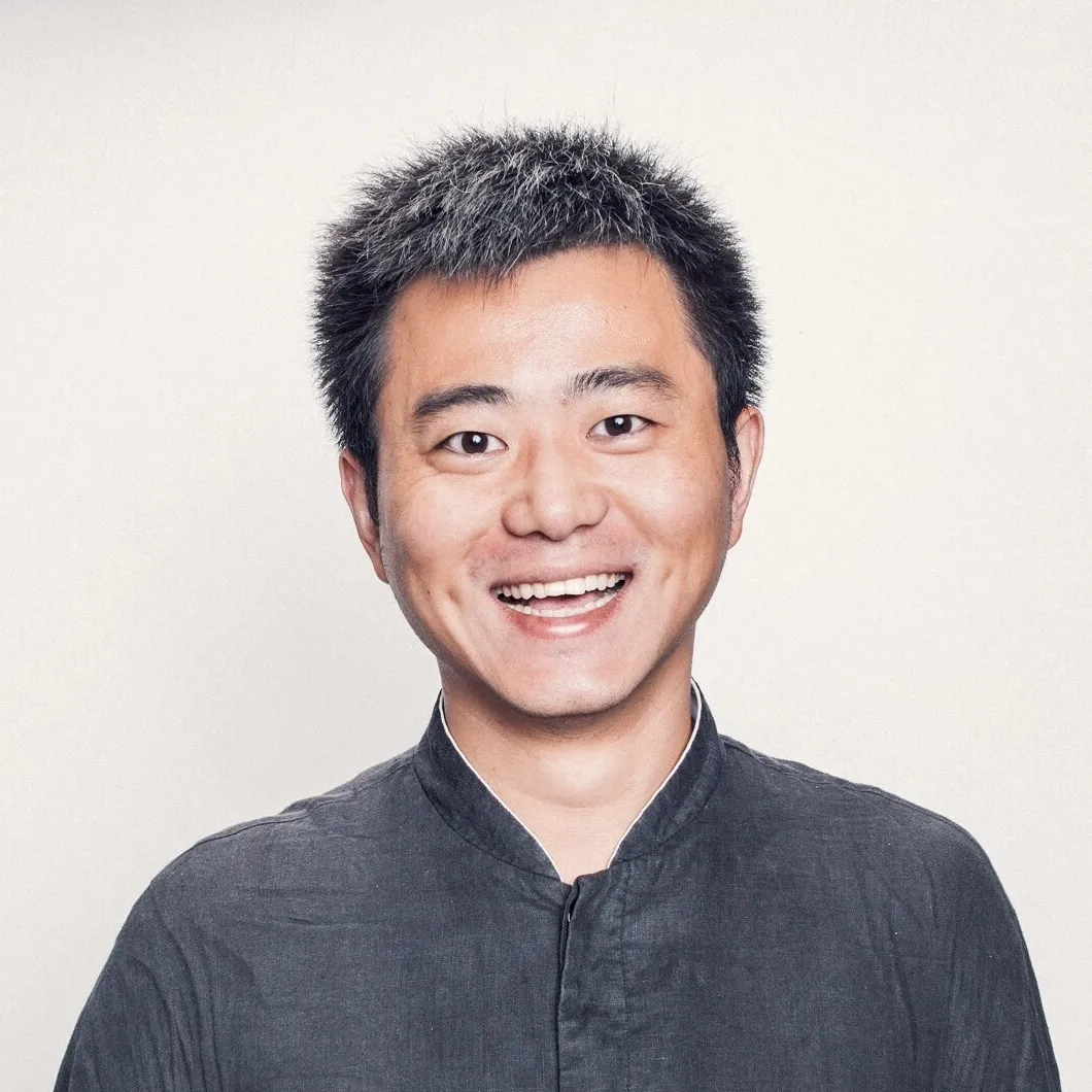 Portrait of Weili Shi, smiling.